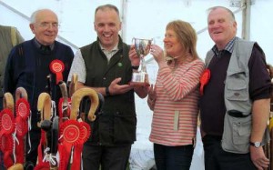 Liz McCracken Presents the John McClelland Memorial Trophy to John Lutton, Irish Stickmaking Champion 2011